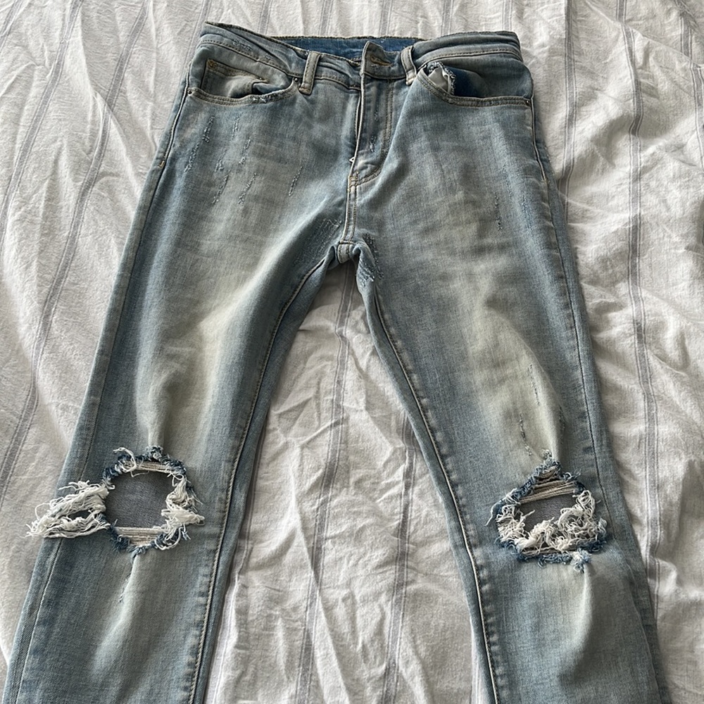 MNNL skinny light blue size 31 jeans with ripped knees